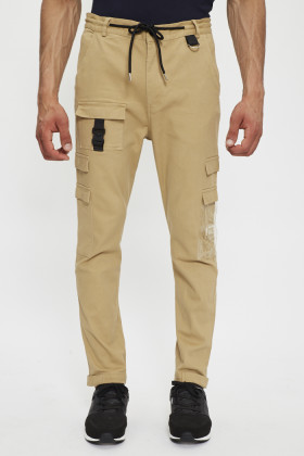 Pantalon beige multipoches pour homme